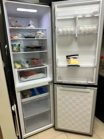 Used double-door bottom freezer refrigerator (excellent condition)