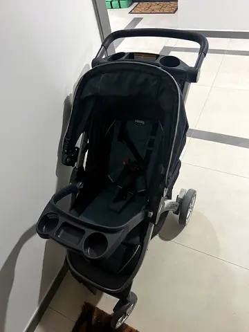 Used single stroller with cup holders and reclining seat - good condition