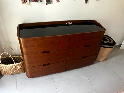 6-drawer wooden dresser with black glass top
