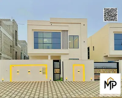 السعر شامل رسوم التسجيل والتمليك موقع ممتاز تمليك حر فيلا للبيع في عجمان تصميم عصري بواجهة حجرية وتشطيبات شخصية فاخرة للغاية