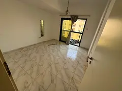 apartment with a living room and maid’s room, featuring central AC in a prime location in Al Majaz