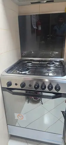 Used freestanding 4-burner gas stove with oven - good working condition