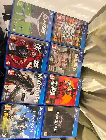 Bundle of 9 PS4 Games — GTA V, Spider-Man, Uncharted, RDR2, FIFA  More