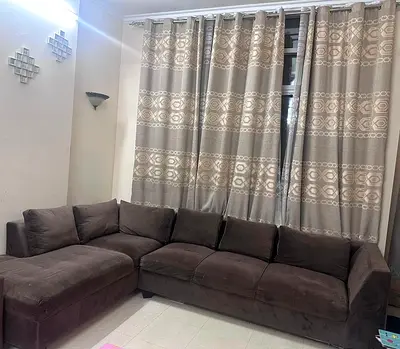 L-shaped 5-seater fabric corner sofa in dark brown — good condition