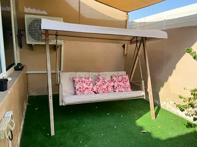 Three-seater outdoor swing bench with canopy — gently used