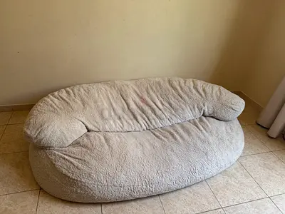 Used cozy two-seater plush lounge sofa — light grey, good condition