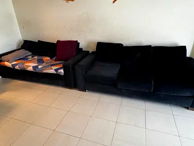 Two black 3-seater sofas - good condition