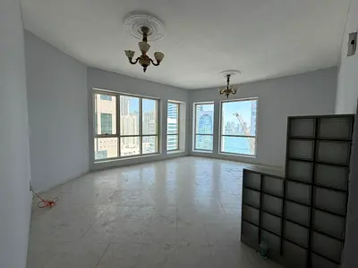 Panoramic sea view with free AC, gym, and pool in a prime, lively location close to cafes, shops, and all services, with easy access to the Dubai exit