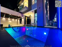 Villa for sale opposite a garden, including registration fees, electricity, water and air conditioni