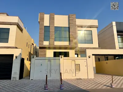 A luxury villa with a modern design for sale in the Al Yasmeen area - Ajman, including air conditioning, two floors and a roof