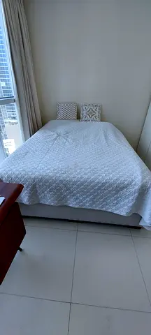 Queen Bed with Englander Mattress and White Quilted Cover — Good Condition