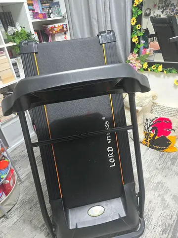 Foldable Lord Fitness Treadmill - Compact Home Treadmill in Good Condition
