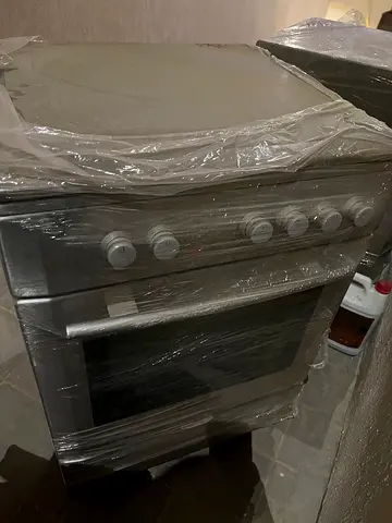 Stainless Steel Freestanding Gas/Electric Cooker with Oven - Good Condition