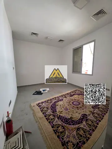 Studio apartment for annual rent in Al Rawda 1, Ajman, in an excellent location and new building. Suitable for quiet living and close to all essential