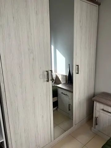 Chevron 3-Door Wardrobe with Mirror – Light Wood Finish. Used