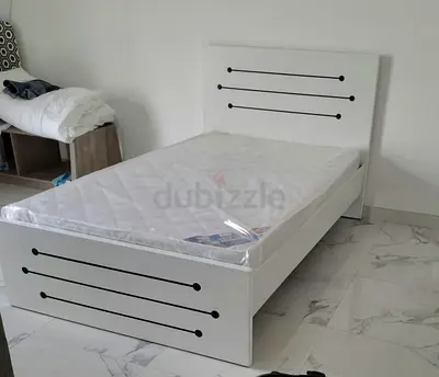Single white wooden bed with mattress — good condition
