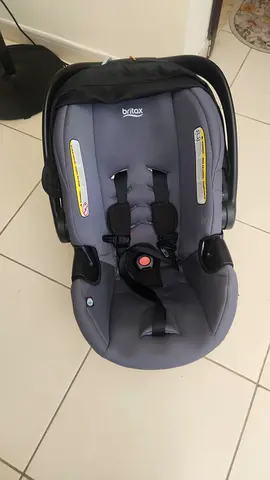 Used grey infant car seat (rear-facing) - good condition