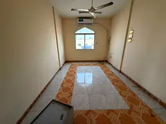 Two-bedroom apartment for annual rent in Liwara 1, Ajman, second row from Ajman Corniche. A prime lo