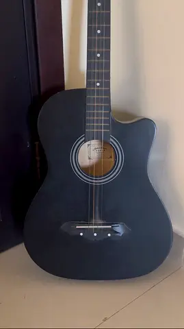 Used black acoustic guitar (plays well, minor wear)