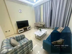 Furnished partitioned 2-room apartment for annual rent in Orient Towers Ajman panoramic creek view b