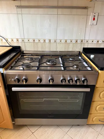 Ariston Stainless Steel Gas Range with Oven - Good Working Condition