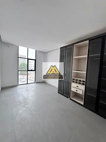 Studio for Annual Rent Prime Location Near Ajman Corniche Brand New Separate Kitchen Built-in Wardrobes Open View Central AC