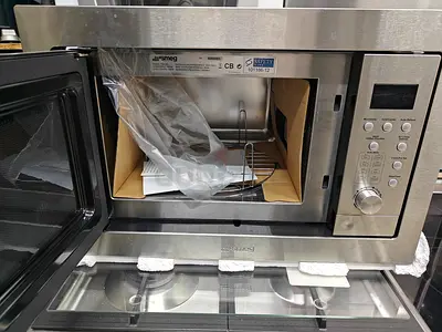 Smeg built in microwave 60cm new