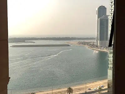 The most luxurious and spacious three-bedroom apartment in Al Taawun, boasting a prime location close to amenities, balconies, and a beautiful view. A