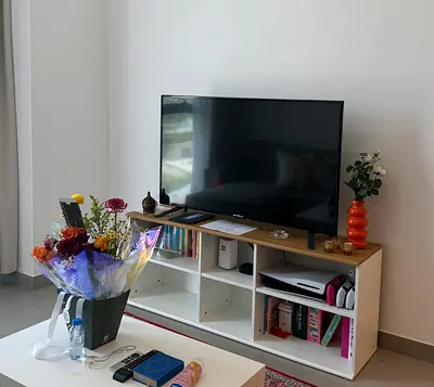 Media table in good condition. White and beige color.  (Selling the table only)