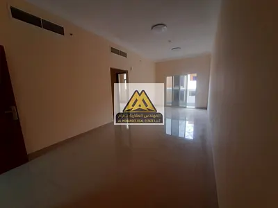 One-bedroom apartment (first occupancy) for annual rent in Al Jurf 3, Ajman, behind the Chinese market, with central air conditioning.