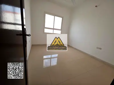 Two-bedroom apartment with a living room for annual rent in Al Rawda 2, Ajman, in a prime location close to all essential services, with easy access t