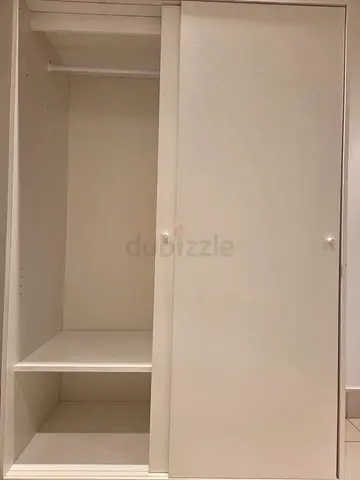 White sliding door wardrobe / armoire - good condition