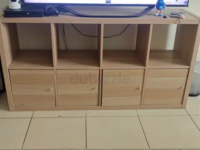 Light wood TV console / storage unit with 4 drawers and 4 open cubbies