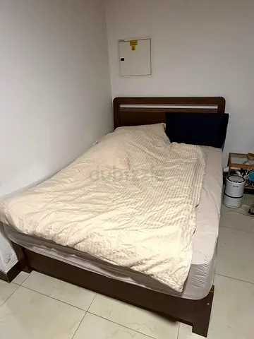 Twin wooden bed frame with mattress - good condition