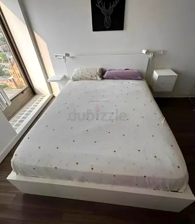 IKEA Malm Queen size bed frame with mattress.