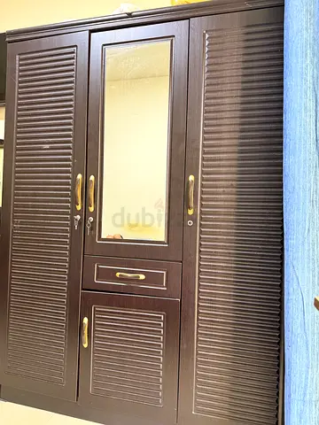 Wooden family wardrobe/cupboard 3 door + center mirror and drawer