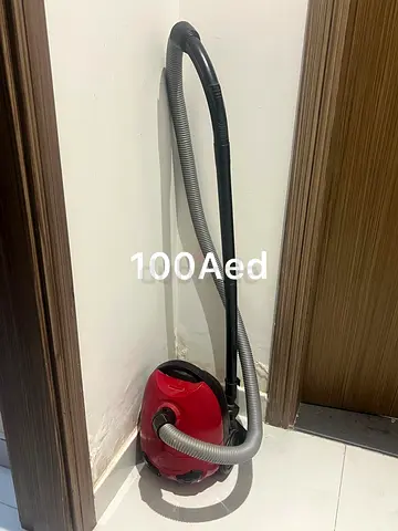 Compact Red Cylinder Vacuum Cleaner - Good Working Condition