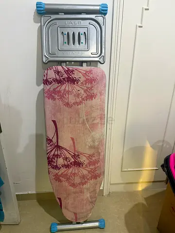Larger Compact ironing board with flower-pattern cover - good condition