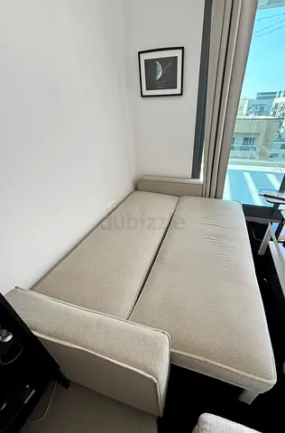 Beige convertible sofa bed - good condition