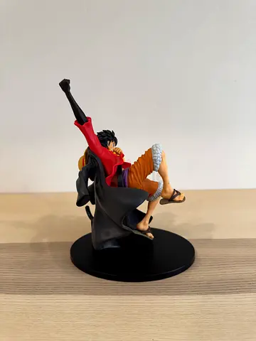 One Piece Monkey D. Luffy Figurine on Display Stand - Good Condition
