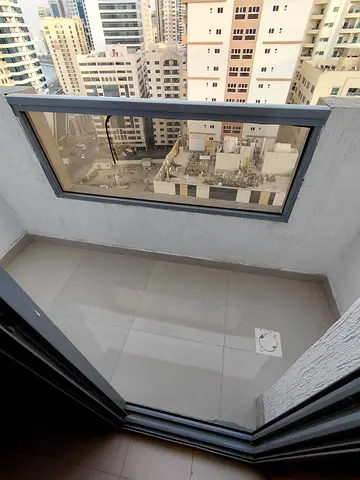 1 Bedroom Hall Apartment for Rent in Al Majaz 3 * Master bedroom * 2 bathrooms * Free parking * Central AC * Very special open view *