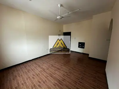 One-bedroom apartment for annual rent in Al Rashidiya 1, Ajman. Spacious, prime location opposite the fish market on Al Mina Street. 6 installments