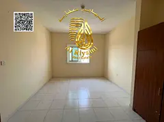 Studio apartment with balcony and separate kitchen for rent in Al Rashidiya 3