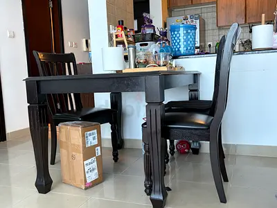 Solid Dark Wood Dining Table with 4 Matching Chairs (one chair has one leg issue)