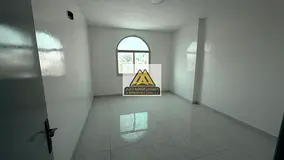 Two-Bedroom Apartment with a Living Room, American-Style Kitchen, and a Prime Location in Al Rawda 2