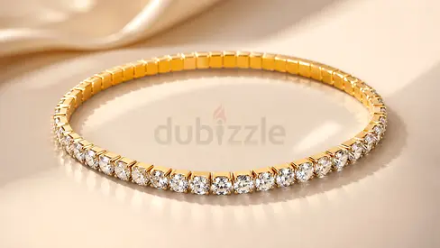 Gold color plated stainless steel tennis bracelet featuring brilliant cubic stones. Elastic design.