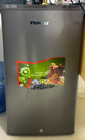 Compact single-door mini fridge - good working condition