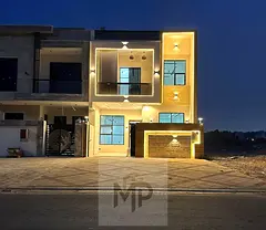Townhouse villa, including registration and ownership fees, modern design, close to a mosque and dir
