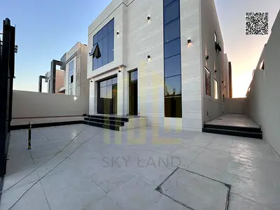 For Sale: Modern villa in Al Helio 2, Ajman, with registration and ownership fees included. Prime location near the mosque and minutes away from Sheik