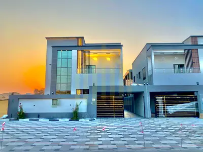 Receive your home in a prime location with a swimming pool in Ajman. Negotiable price, including registration fees, central air conditioning, and free